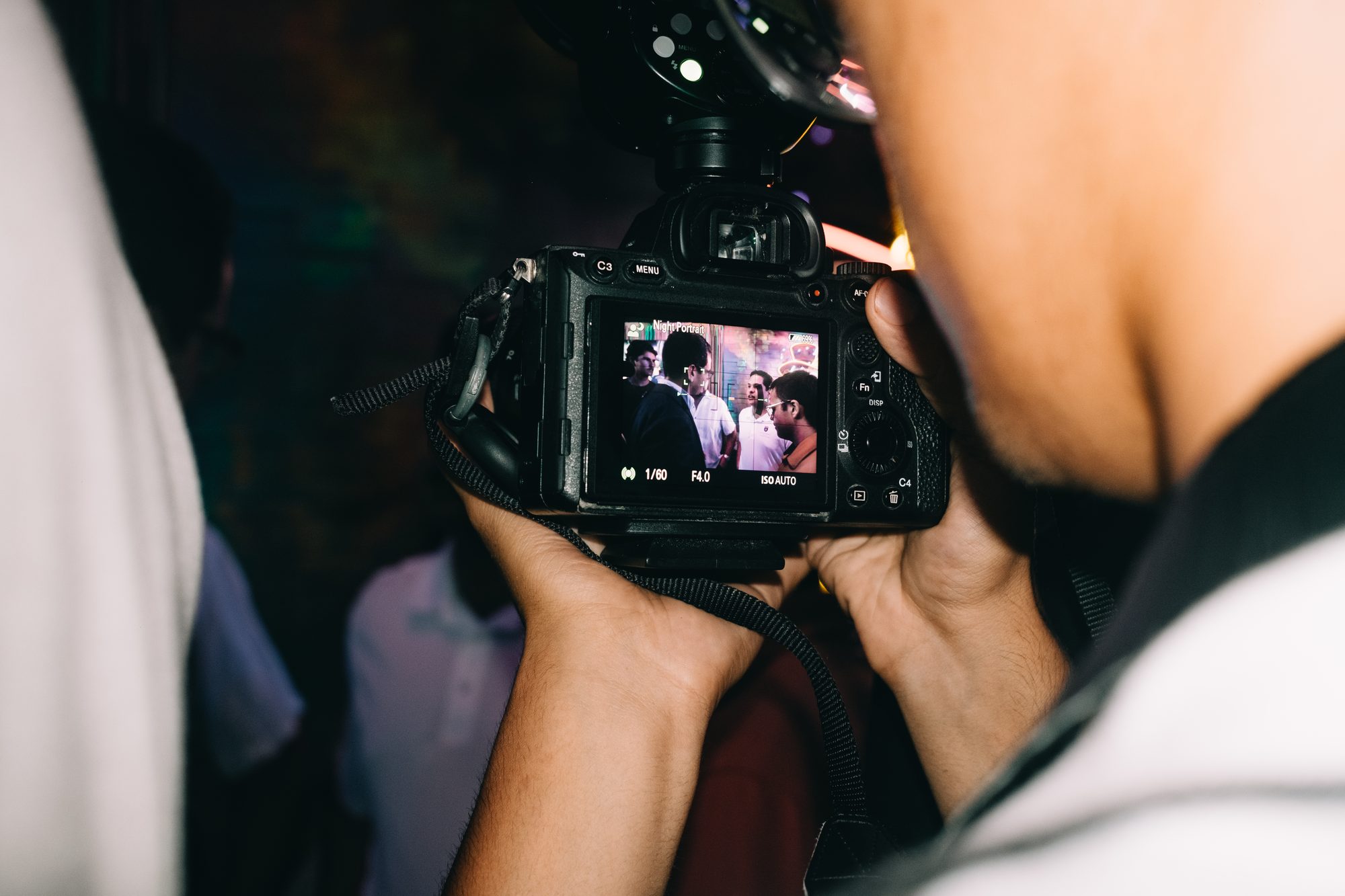 Camera screen showing the candidate with the crowd