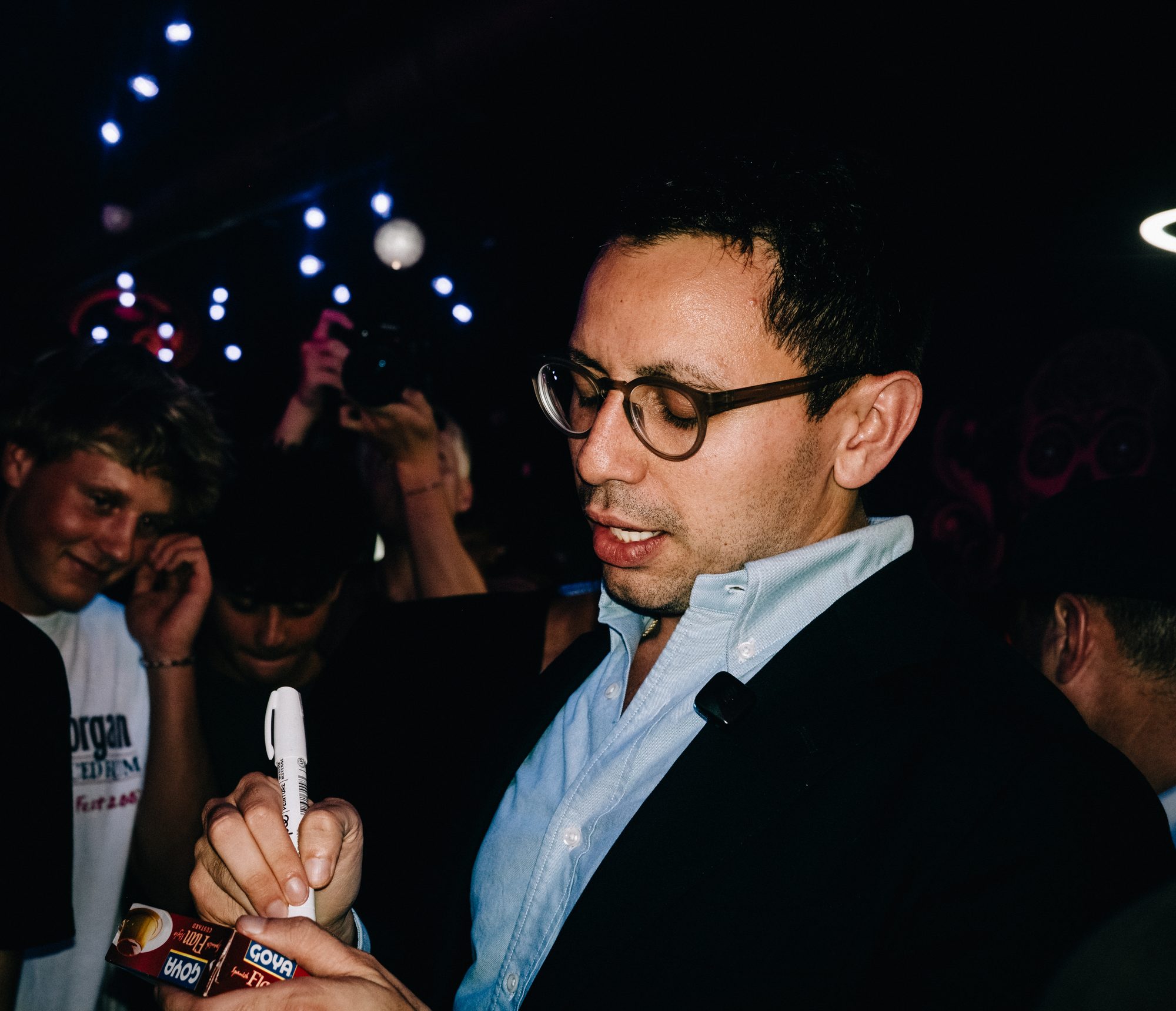 Candidate signing something for a supporter