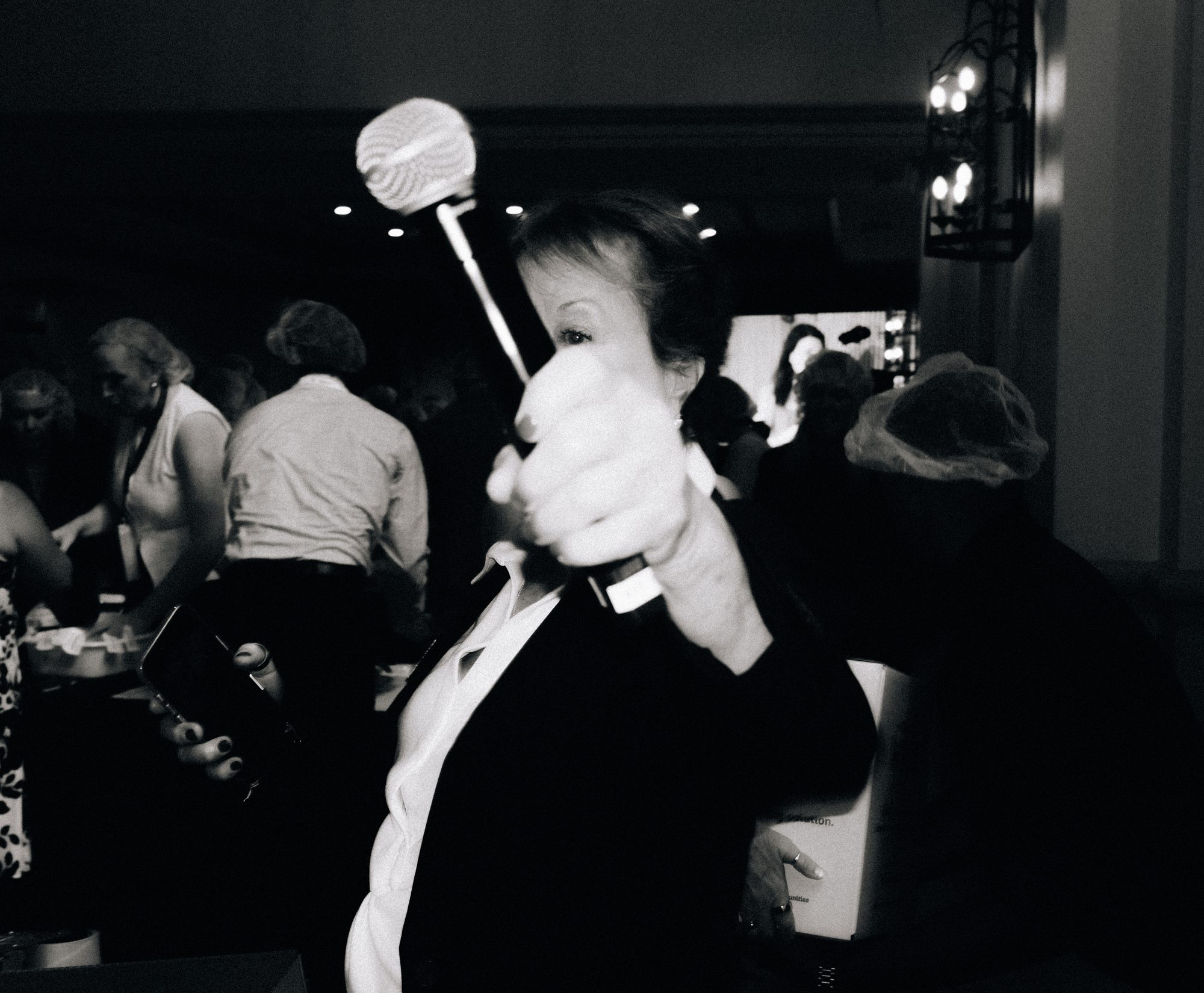 Guest in the crowd at a party, black and white