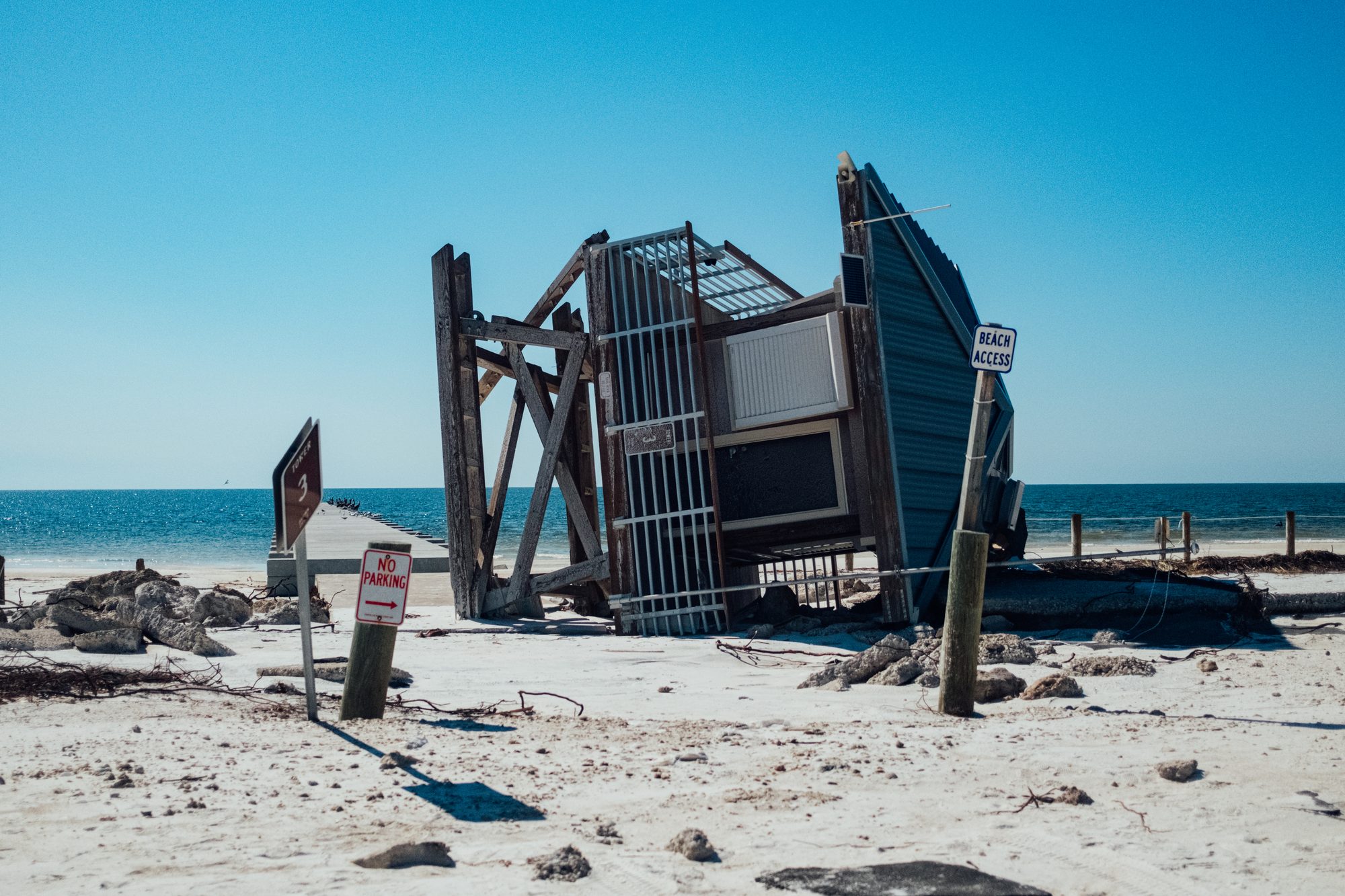 Collapsed structure standing on the beach